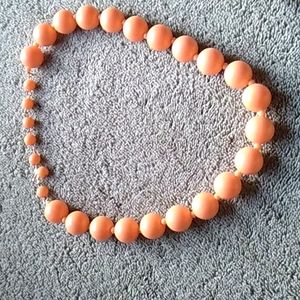 Orange simulated pearl necklace